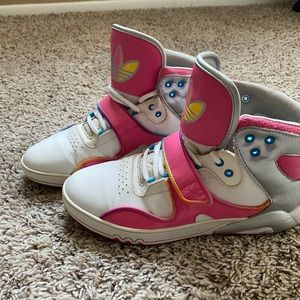 High top adidas pink and white